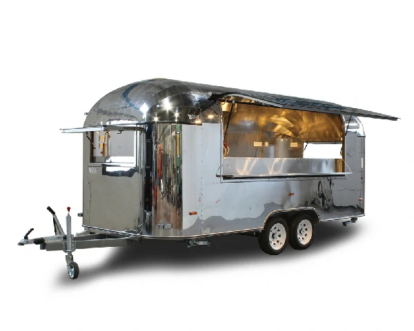 Mobiler Foodtrailer im Airstream-Stil aus Edelstahl, geeignet für Streetfood oder Gastronomie.
