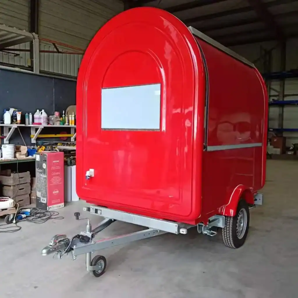 Rounded food trailer under construction, ideal for mobile catering and vending.