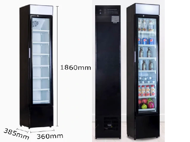Slim vertical display fridge with transparent door for beverages or chilled items.